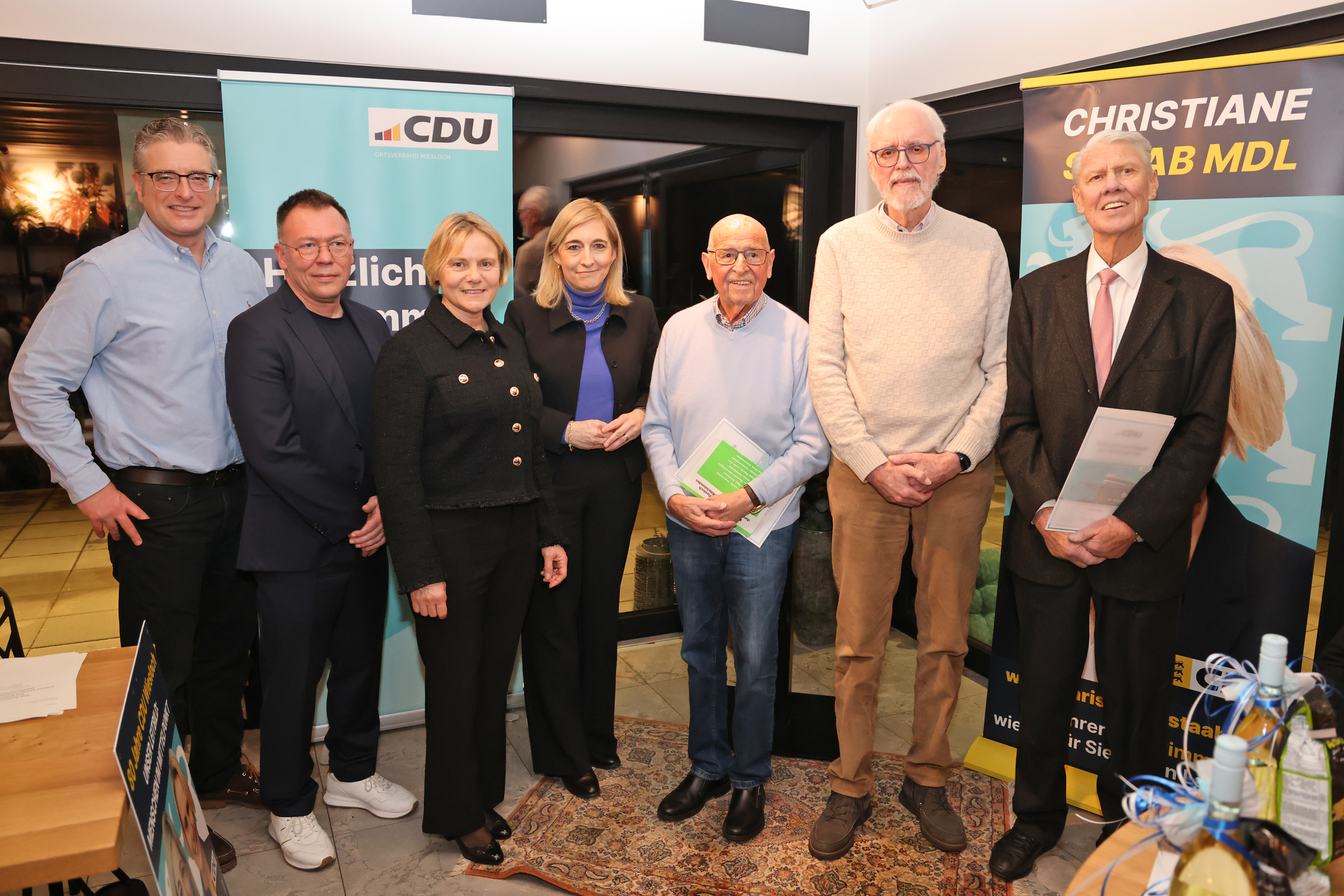 Von links nach rechts: Michael Wanner, Klaus Pfaff, Christiane Staab MdL, Bundesgesundheitsministerin Nina Warken MdB, Eduard Hoffmann (40 Jahre), Dr. Gerd Grossmann (50 Jahre) und Helmut Wimmer (50 Jahre). / Foto: Busse